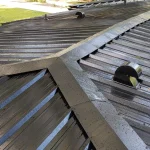 Black metal roof, freshly installed.