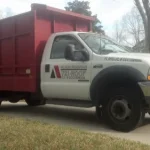 Close up of a semi truck with garbage trailer.